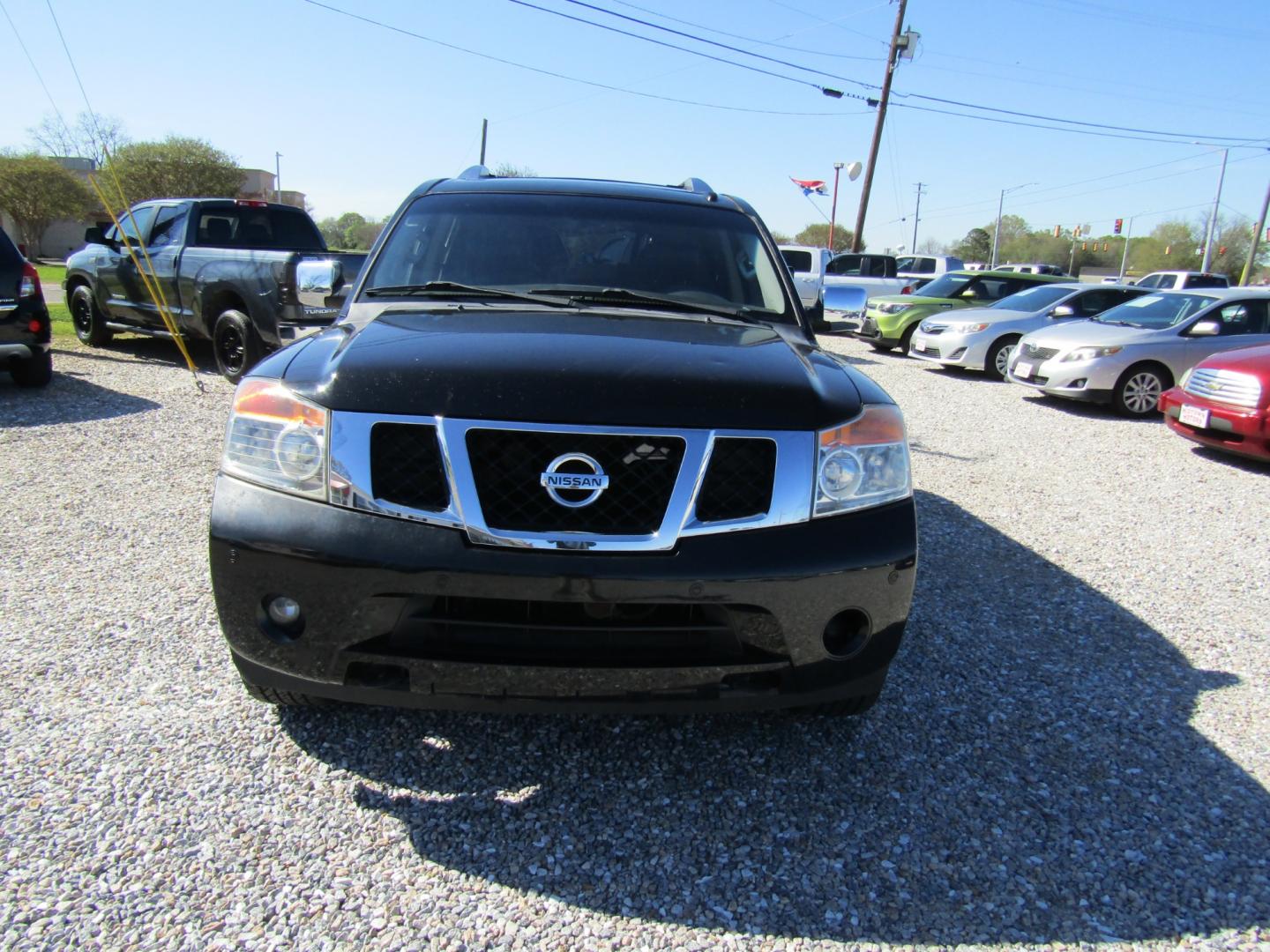 2014 Black Nissan Armada Platinum 2WD (5N1BA0NF9EN) with an 5.6L V8 DOHC 32V FFV engine, Automatic transmission, located at 15016 S Hwy 231, Midland City, AL, 36350, (334) 983-3001, 31.306210, -85.495277 - Photo#1